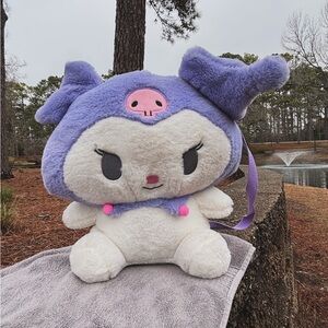 Others Follow Purple and White Stuffed Animal